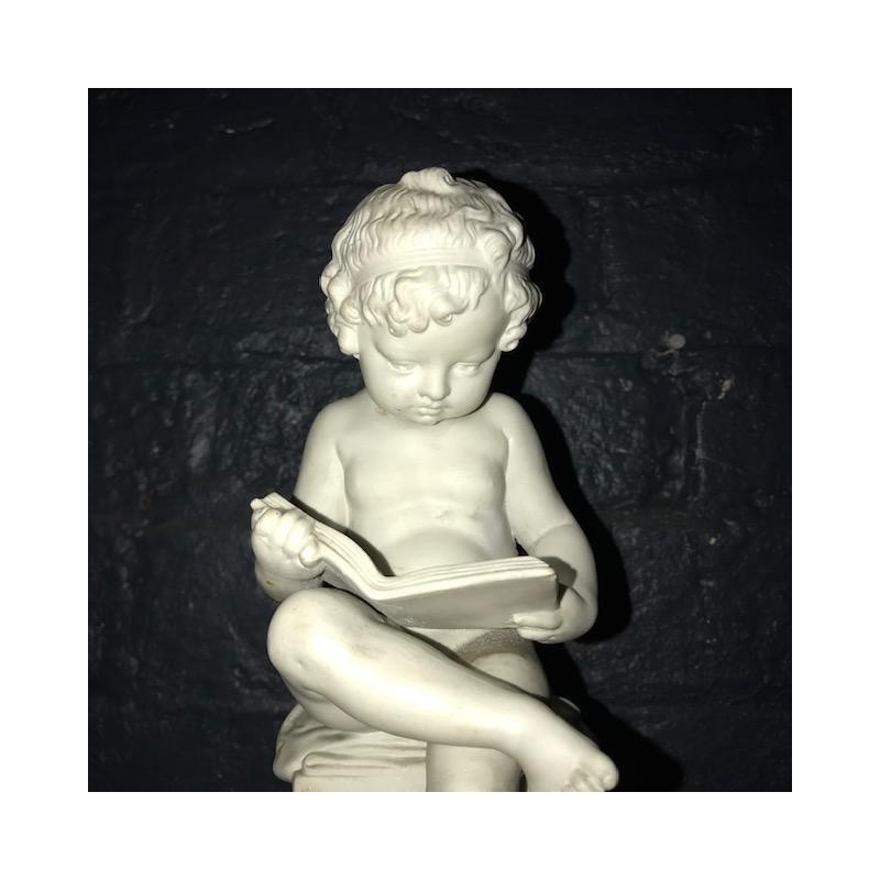 Early C20th Biscuit Statue of a Boy reading